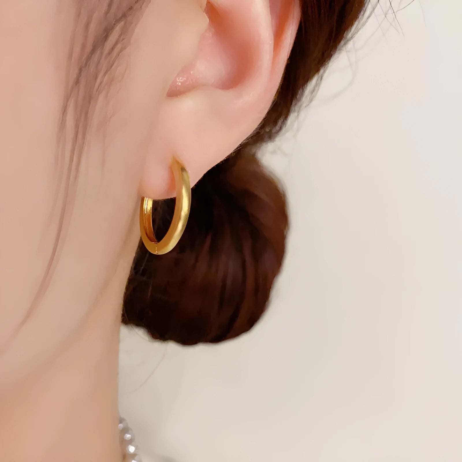 Geometric circle ear clip in gold finish with real gold plating on copper material