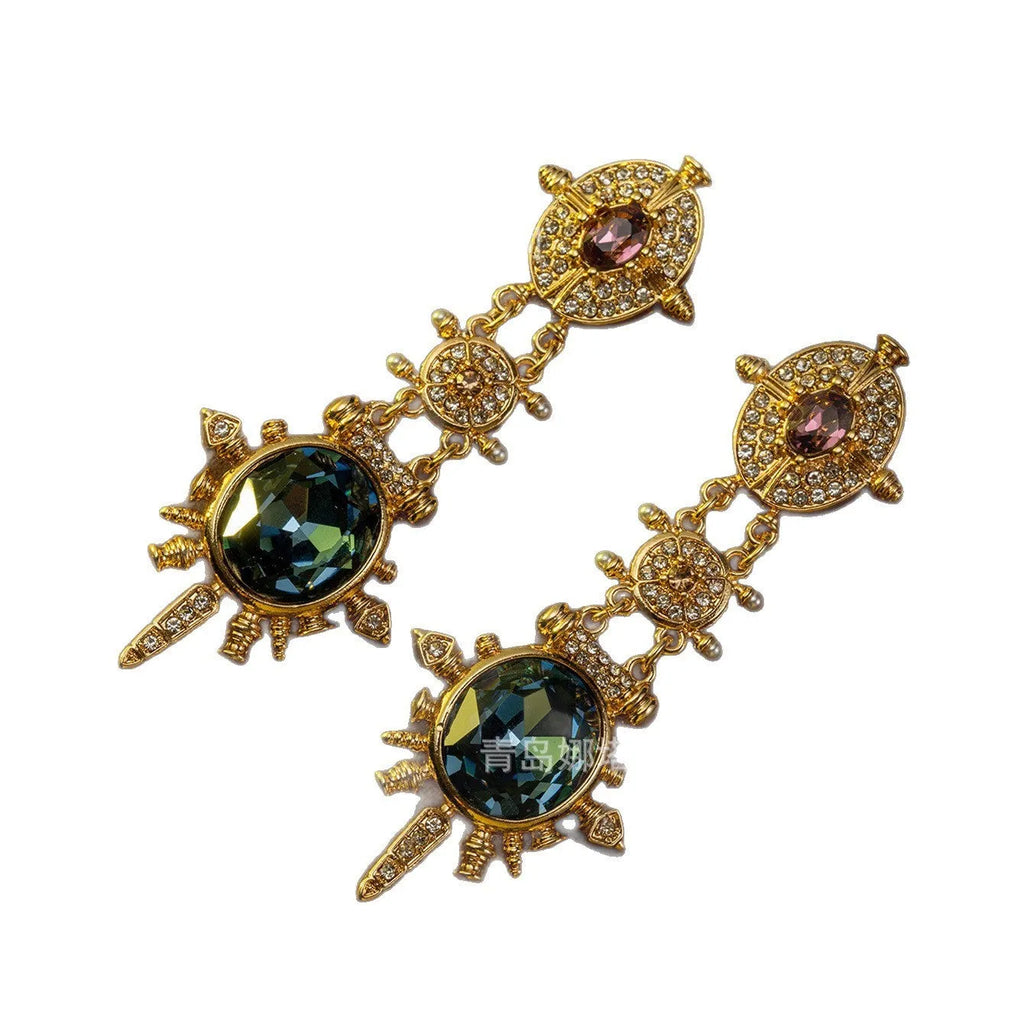 Geometric court style retro stud earrings with gold finish and round elements