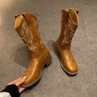 Brown women's mid-calf Martin boots with embroidered pattern and square low heel.