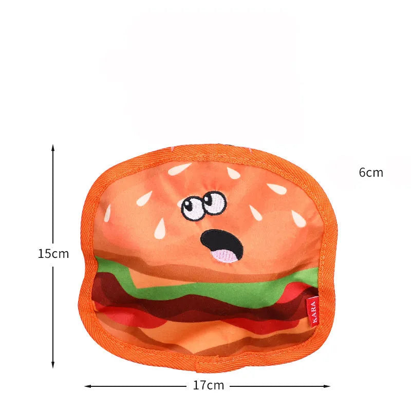 Food shaped dog chew toys with crinkle and squeak sounds including hamburger, pizza, hot dog and fries designs