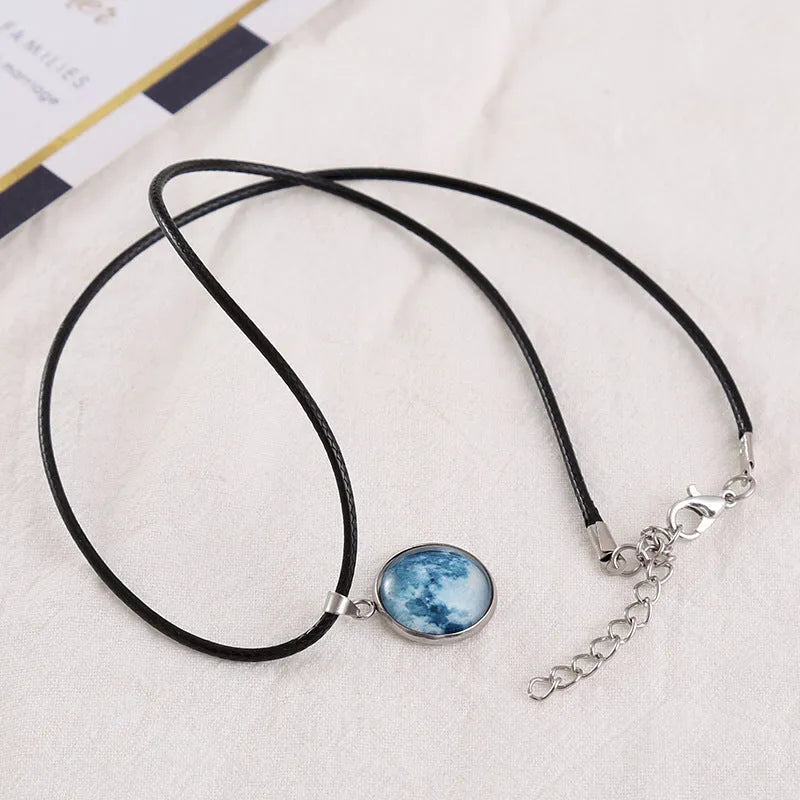 Luminous alloy necklace with a glass constellation pendant on an adjustable chain.