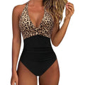 Women's printed backless one-piece bikini swimsuit with lace-up gathers, shown in a floral pattern.