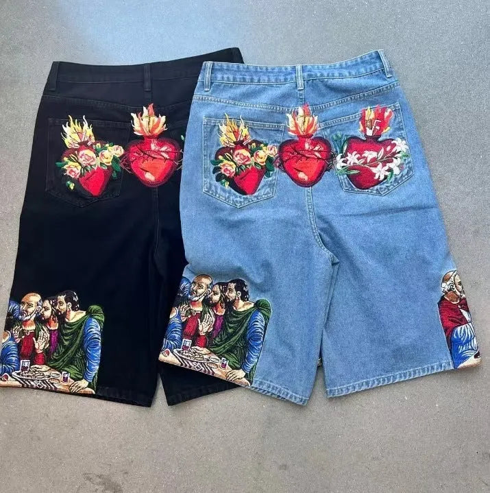 Men's blue cotton shorts with a Jesus print on the back pocket, shown from a rear angle.