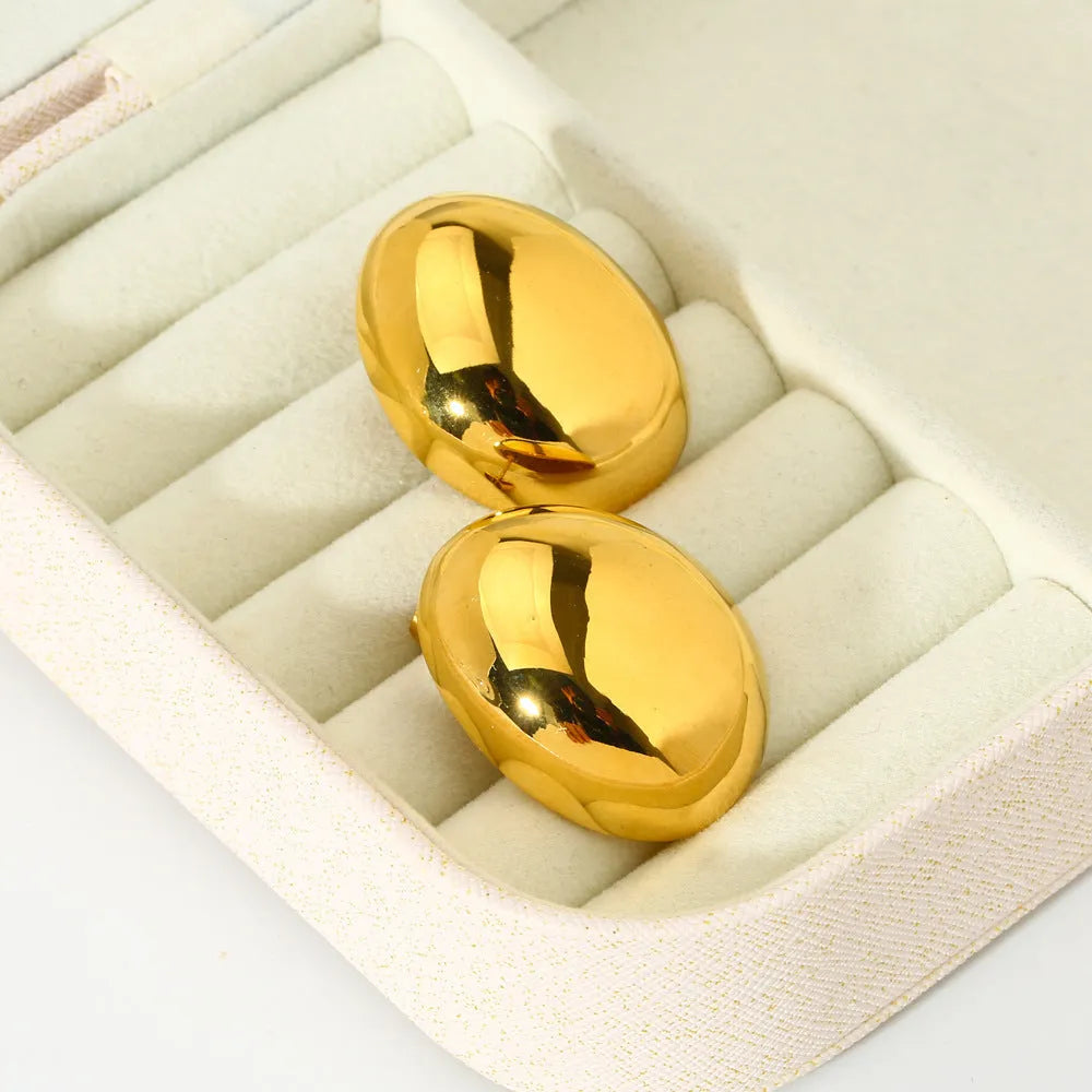Geometric stainless steel ear studs with line pattern and electroplated glazed finish in colour DFE139