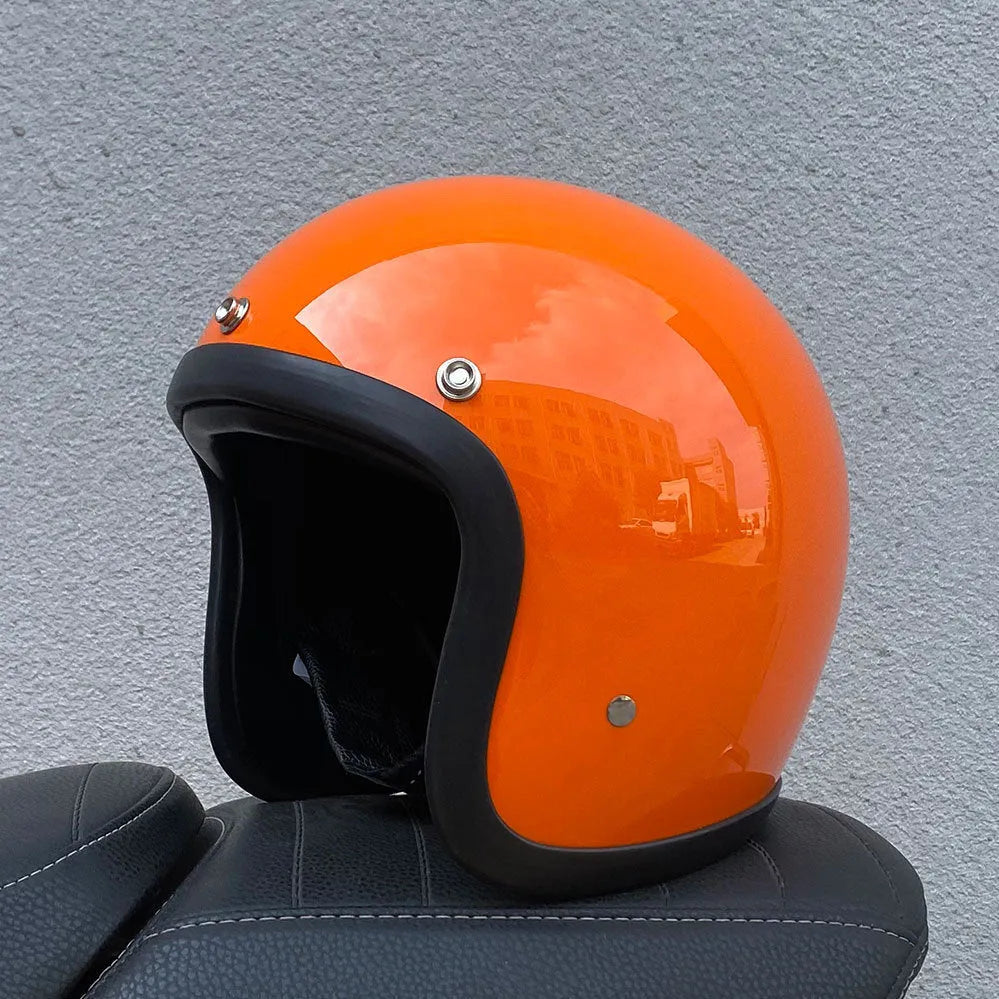 Glass fibre motorcycle half helmet shown in a retro style on a stand.