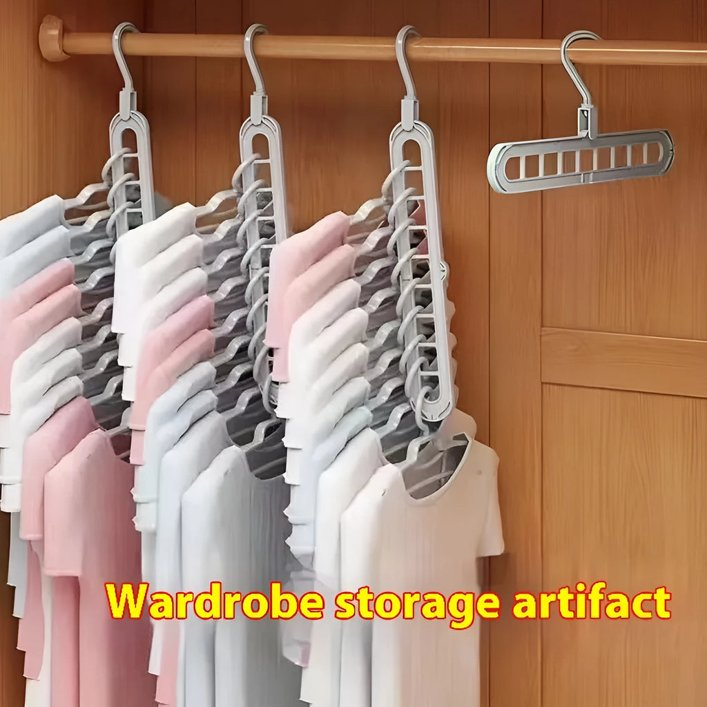 Green plastic nine-hole folding trouser hanger showing multiple trousers hung