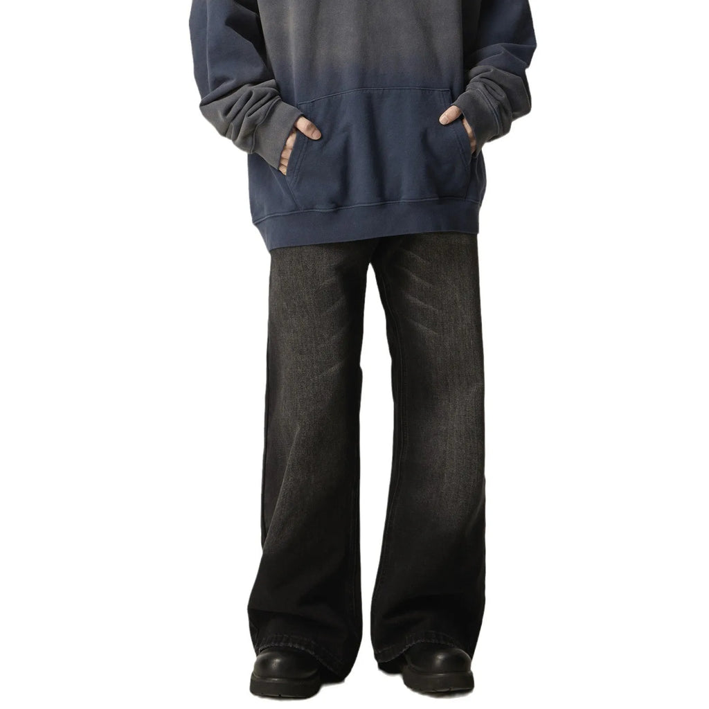 Black loose straight-leg jeans with retro styling and zipper fly
