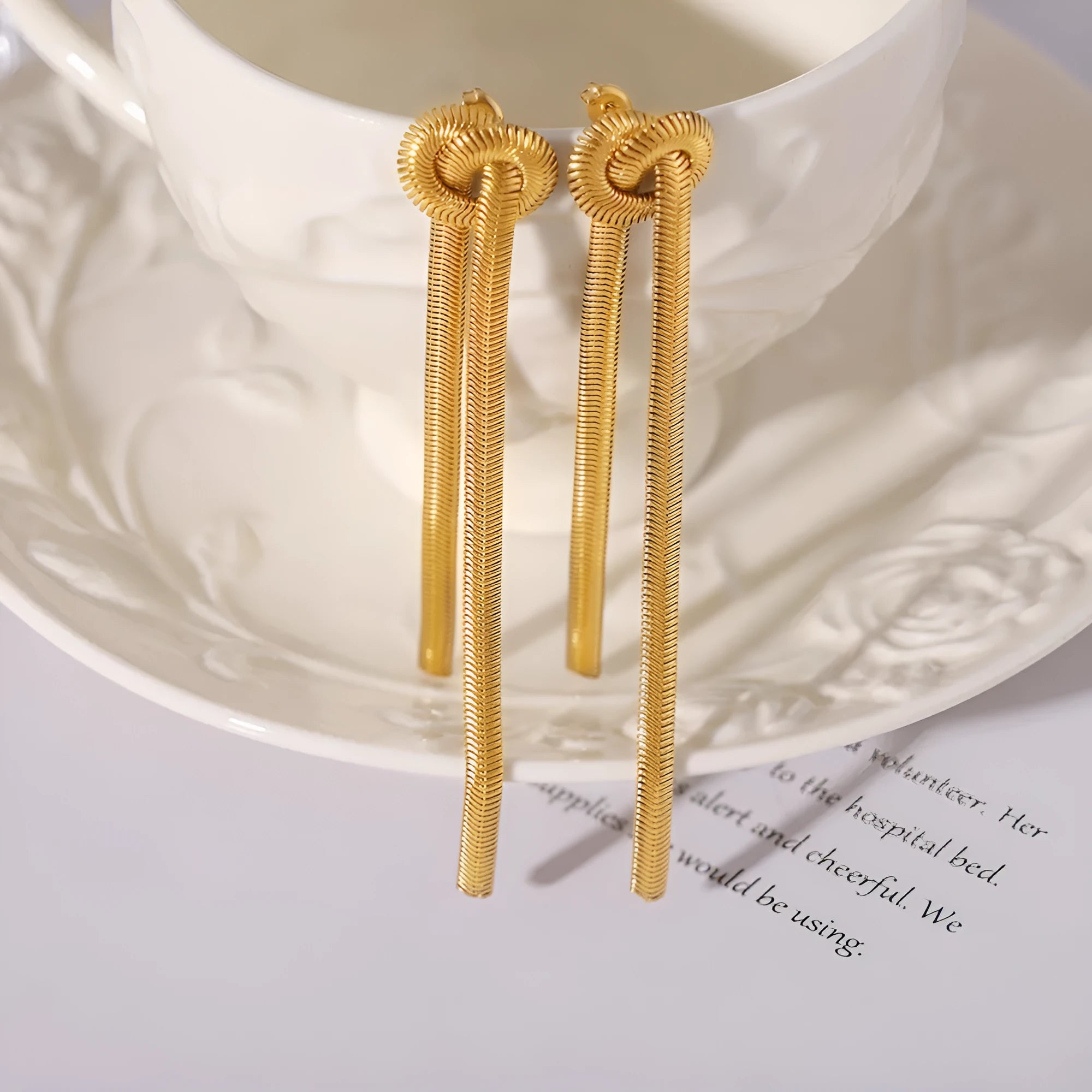 Gold titanium steel knotted tassel necklace and matching earrings set with snake chain