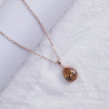 Rose gold pink drop shape alloy necklace with rhinestone and geometry elements