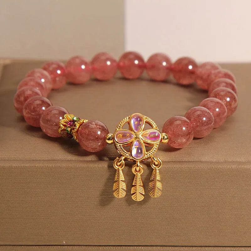 Natural strawberry quartz bracelet with four leaf clover dream catcher pendant on adjustable cord