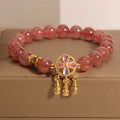 Natural strawberry quartz bracelet with four leaf clover dream catcher pendant on adjustable cord