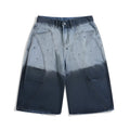 Blue tie-dye gradient cropped jeans with washed-out finish and loose fit