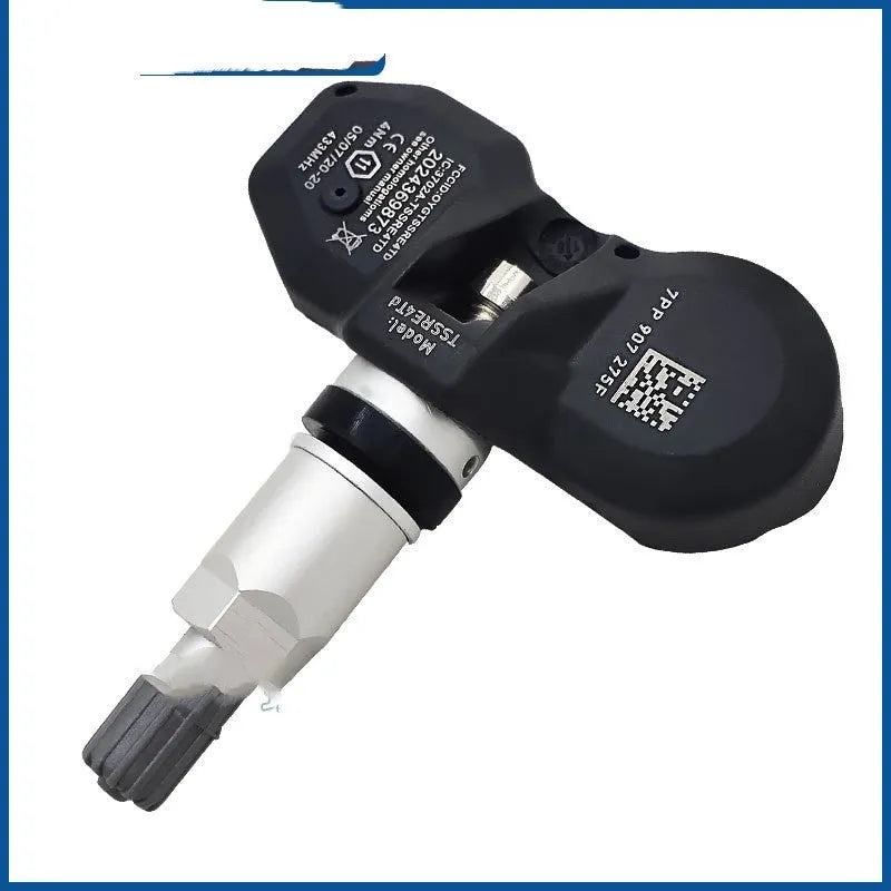 Black car tyre pressure monitor unit for Audi vehicles on white background