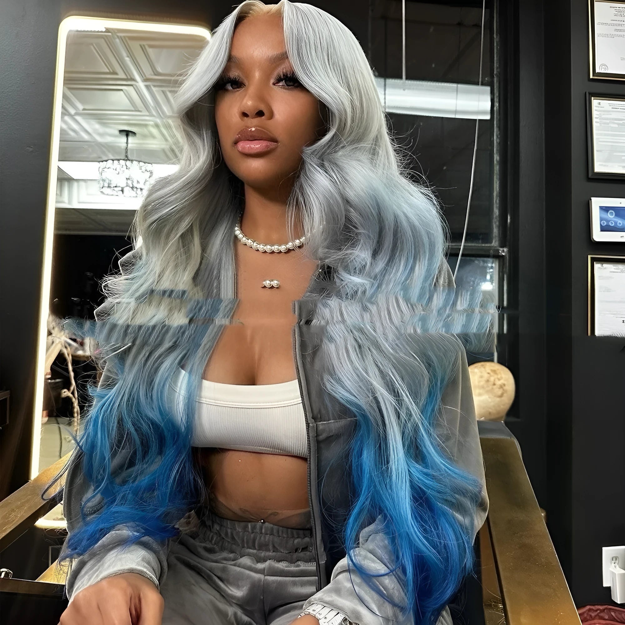 Grey blue gradient human hair headgear wig in Ruili style on a display stand.