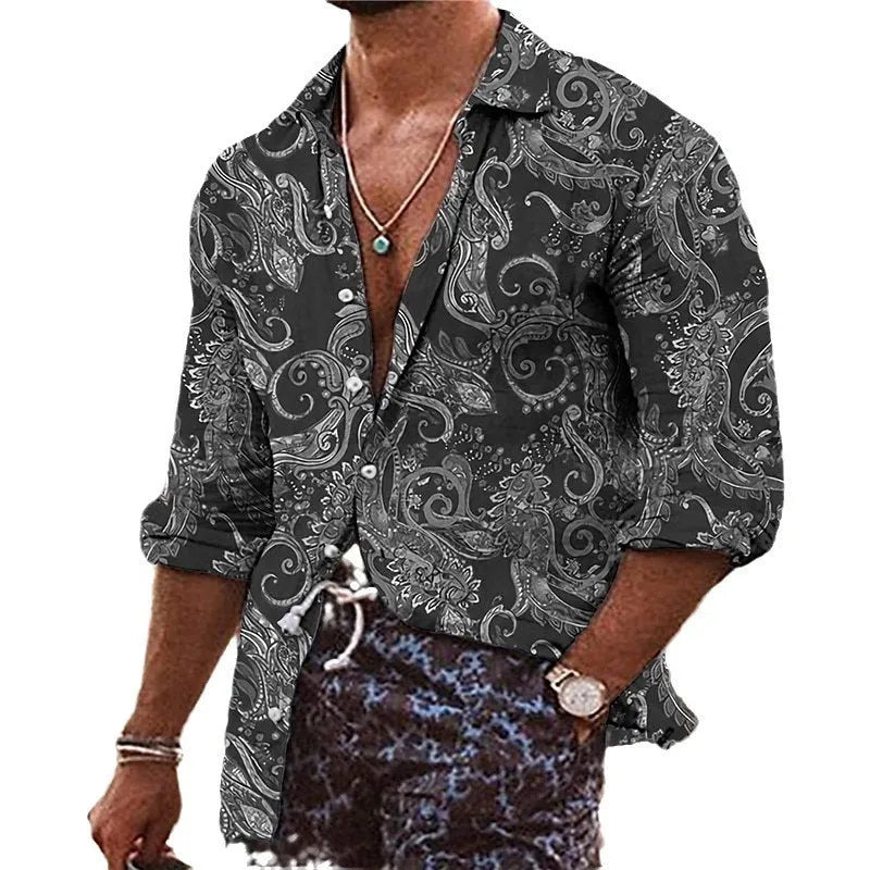 Man wearing a loose-fit long sleeve shirt with a colourful bohemian floral 3D print pattern.