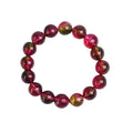 Women's watermelon crystal bracelet showing pink and green natural stone beads in selected size on wrist