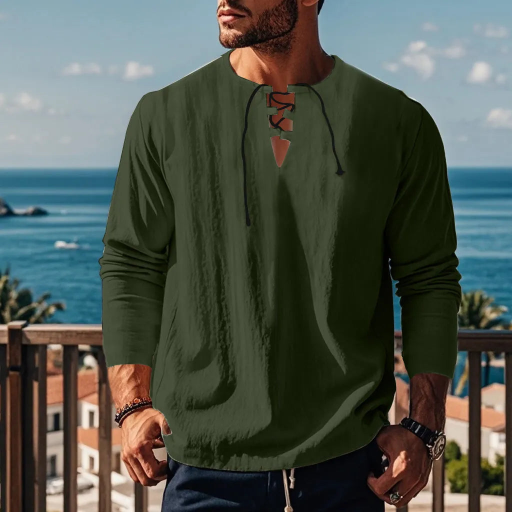 Cotton linen beach ruff shirt in a loose pullover style on a hanger.