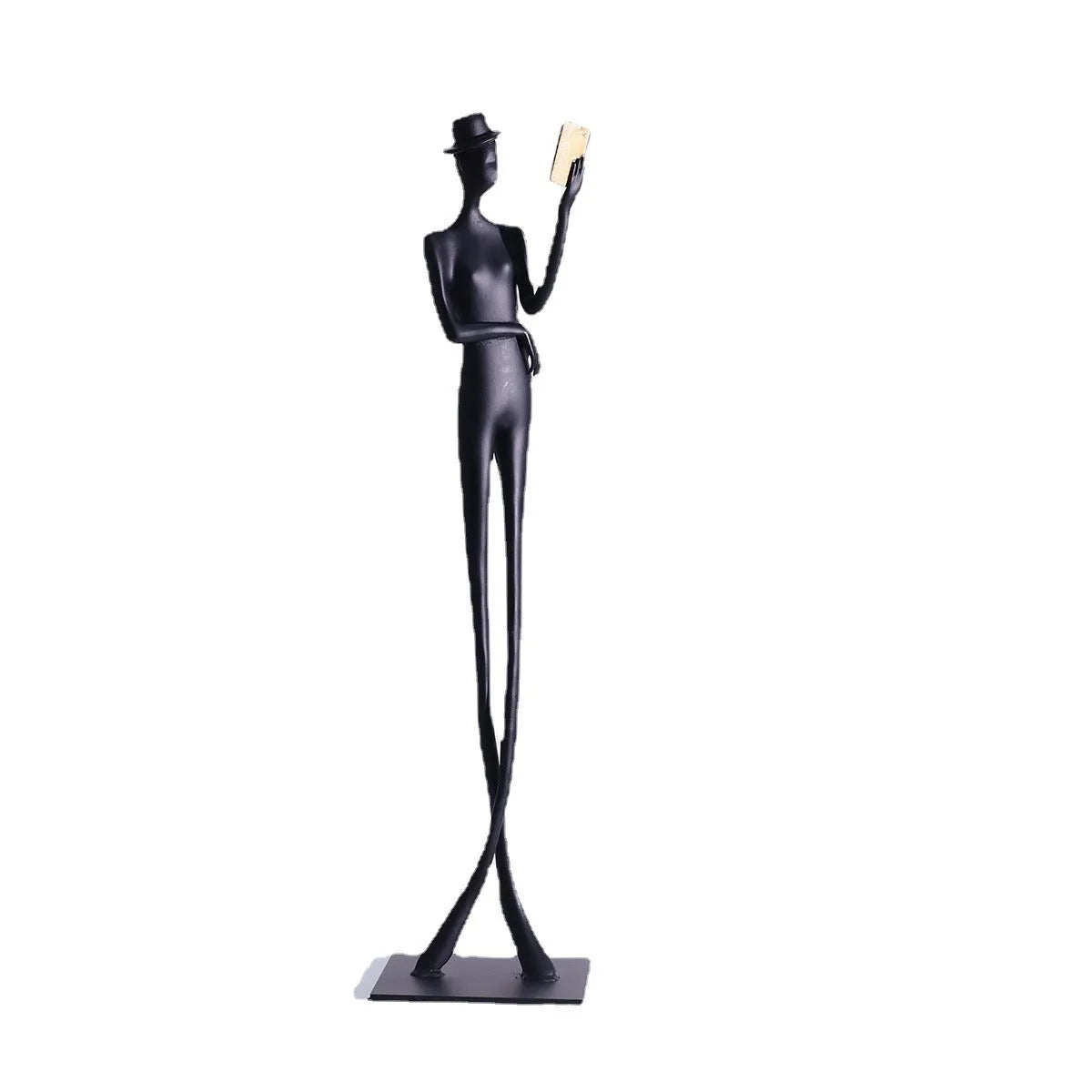 Black cast aluminium sculpture of a woman reading, modern design, 51cm tall.