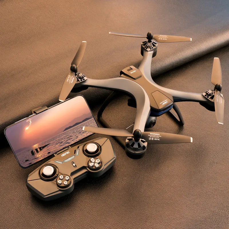White plastic quadrocopter drone with four rotors, a dual camera system on the front, and blue propeller guards.