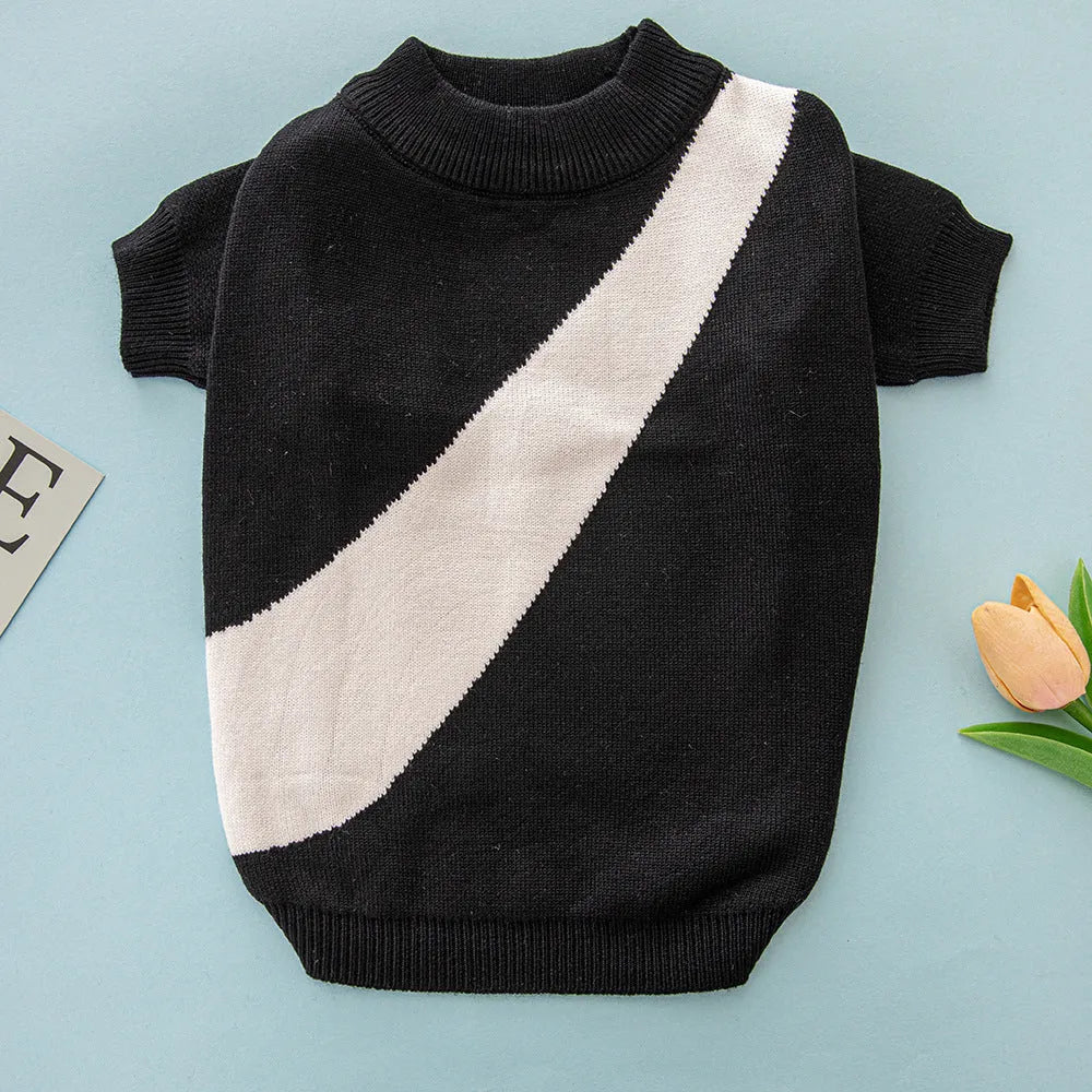 A corgi or poodle wearing a casual-style wool sweater in one of six available colours.
