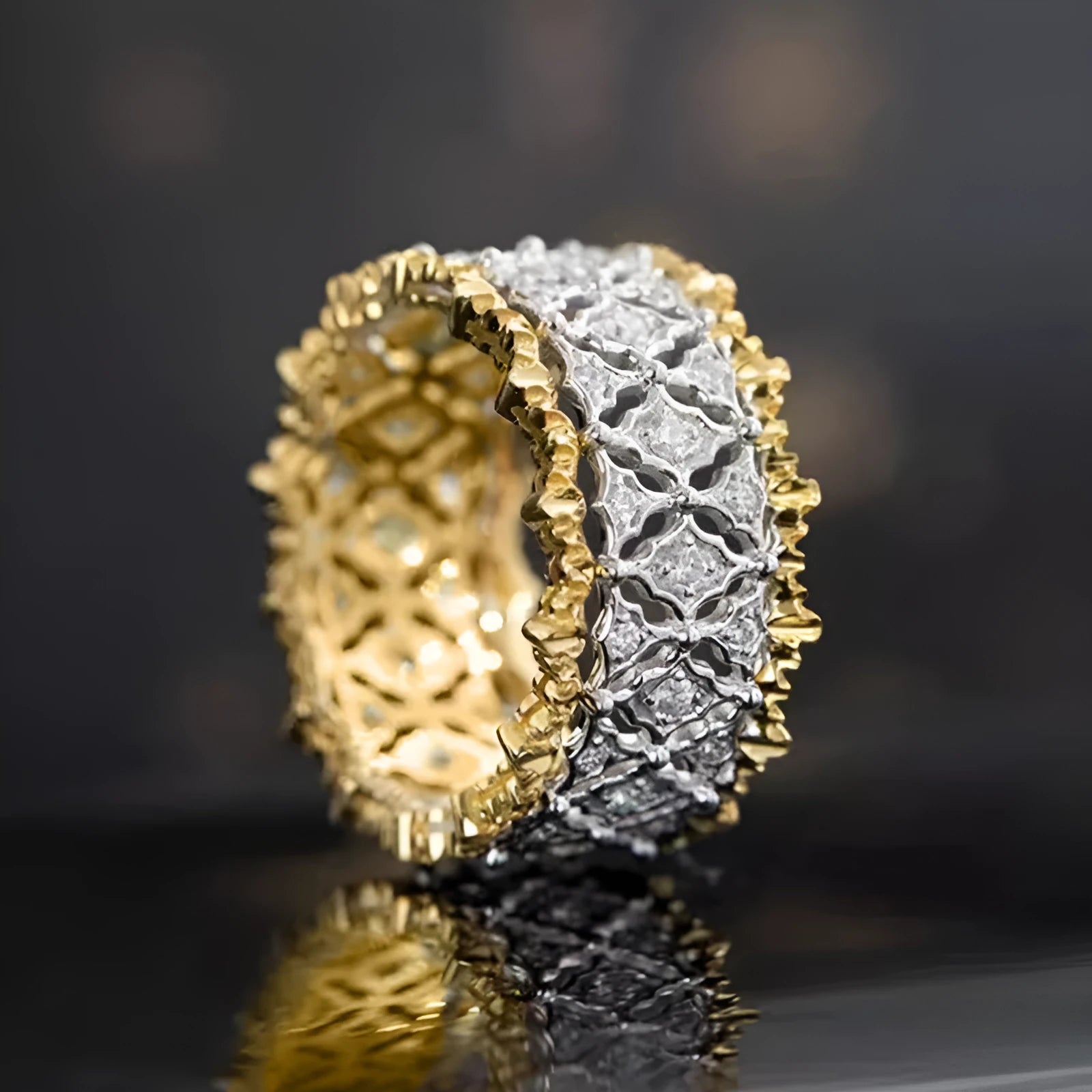 Gold and silver two-tone geometric zircon ring made from copper, showing a round design detail.