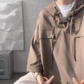 Man wearing black hooded short sleeve T-shirt with loose fit for summer casual wear