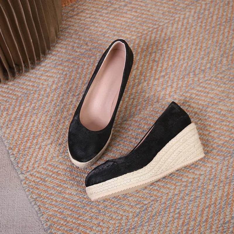 Women's apricot wedge high heel pumps with round toe and shallow mouth on a white background.