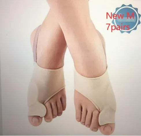 Pair of beige corrective toe socks with a clear silicone gel bunion pad and toe separator.