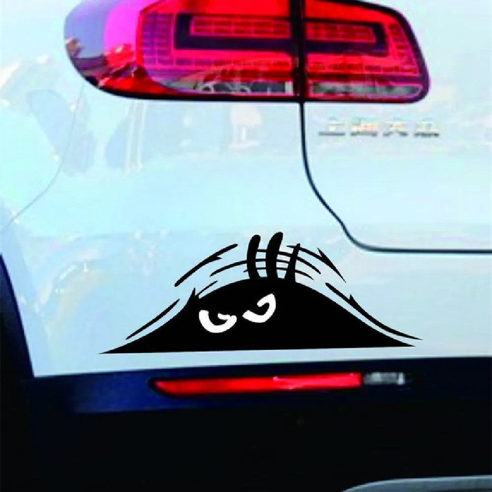 Self-adhesive body stickers showing four designs: black smiley, black angry, white smiley and colourful smiley faces