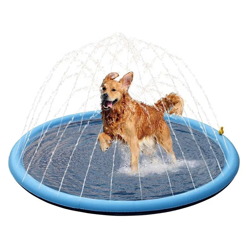 Inflatable blue dog sprinkler pool mat with anti-slip texture, connected to a garden hose in a garden.