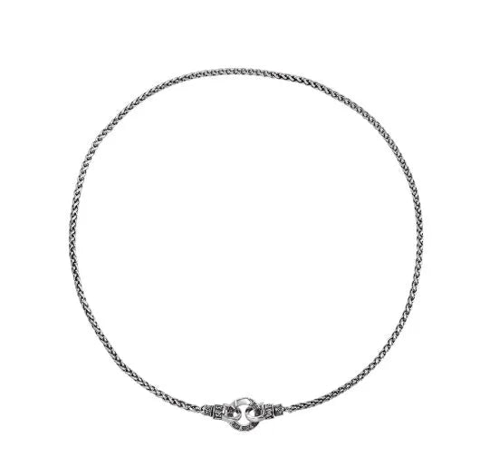 Delicate sterling silver clavicle necklace with pendant on a silver chain.