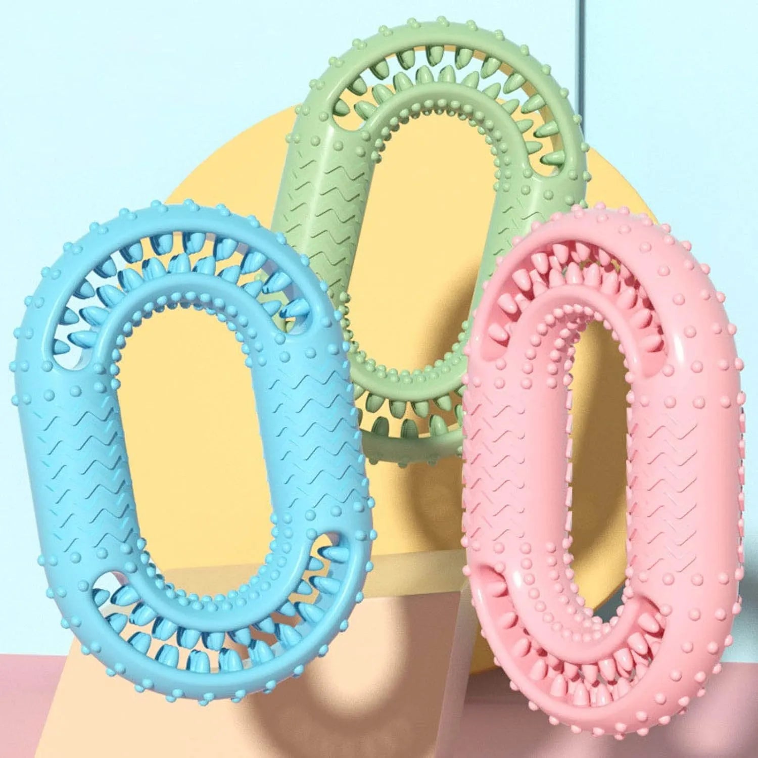 Blue durable rubber O-ring dog chew toy with dental cleaning ridges for aggressive chewers