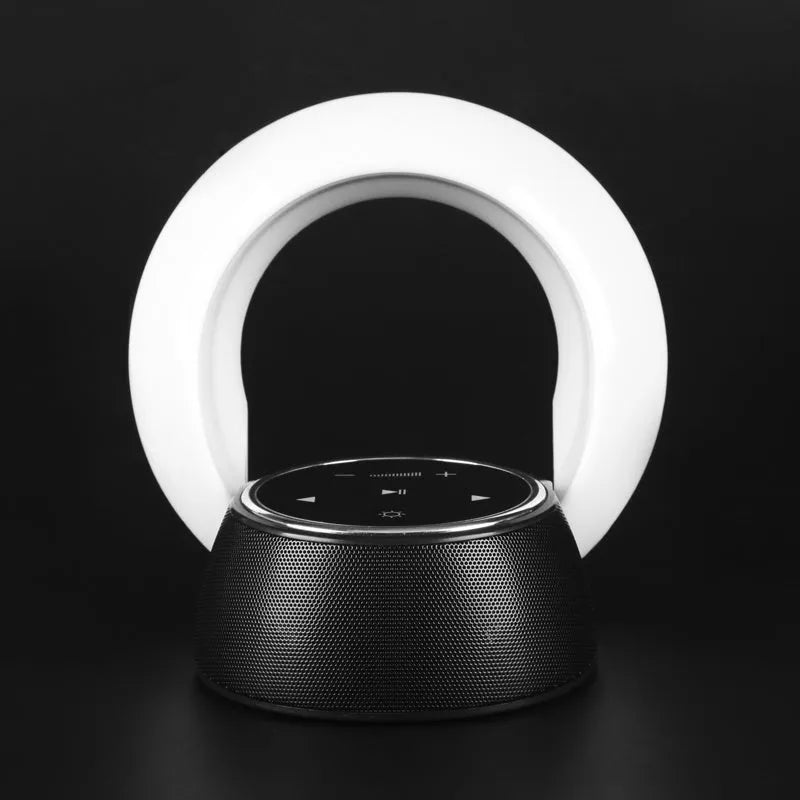 Blue foldable Bluetooth desk lamp speaker with touch controls for dimmable LED lighting.