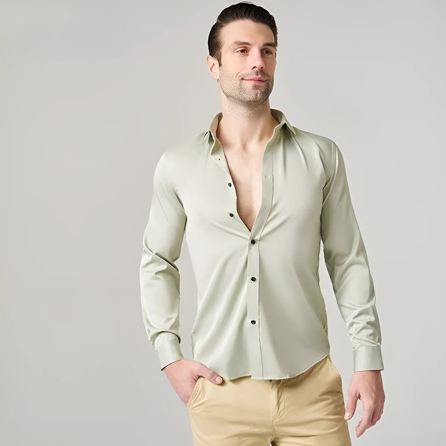 Men's stretch long sleeve work shirt in polyester fabric on a hanger