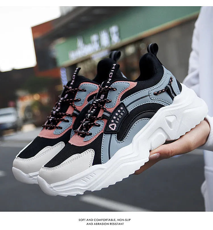 Women's white thick-soled casual sports shoes with mesh upper and buckle detail in Moonlight colour.