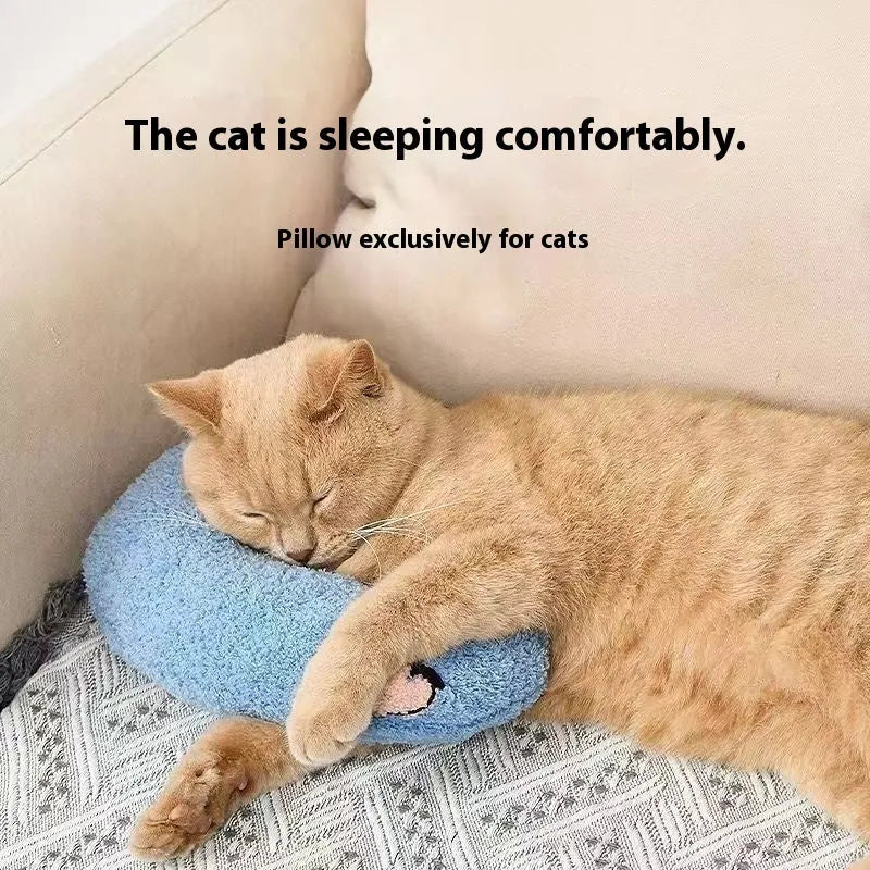 Blue U-shaped cat neck pillow in moon style next to a yellow question mark shaped pet bed.