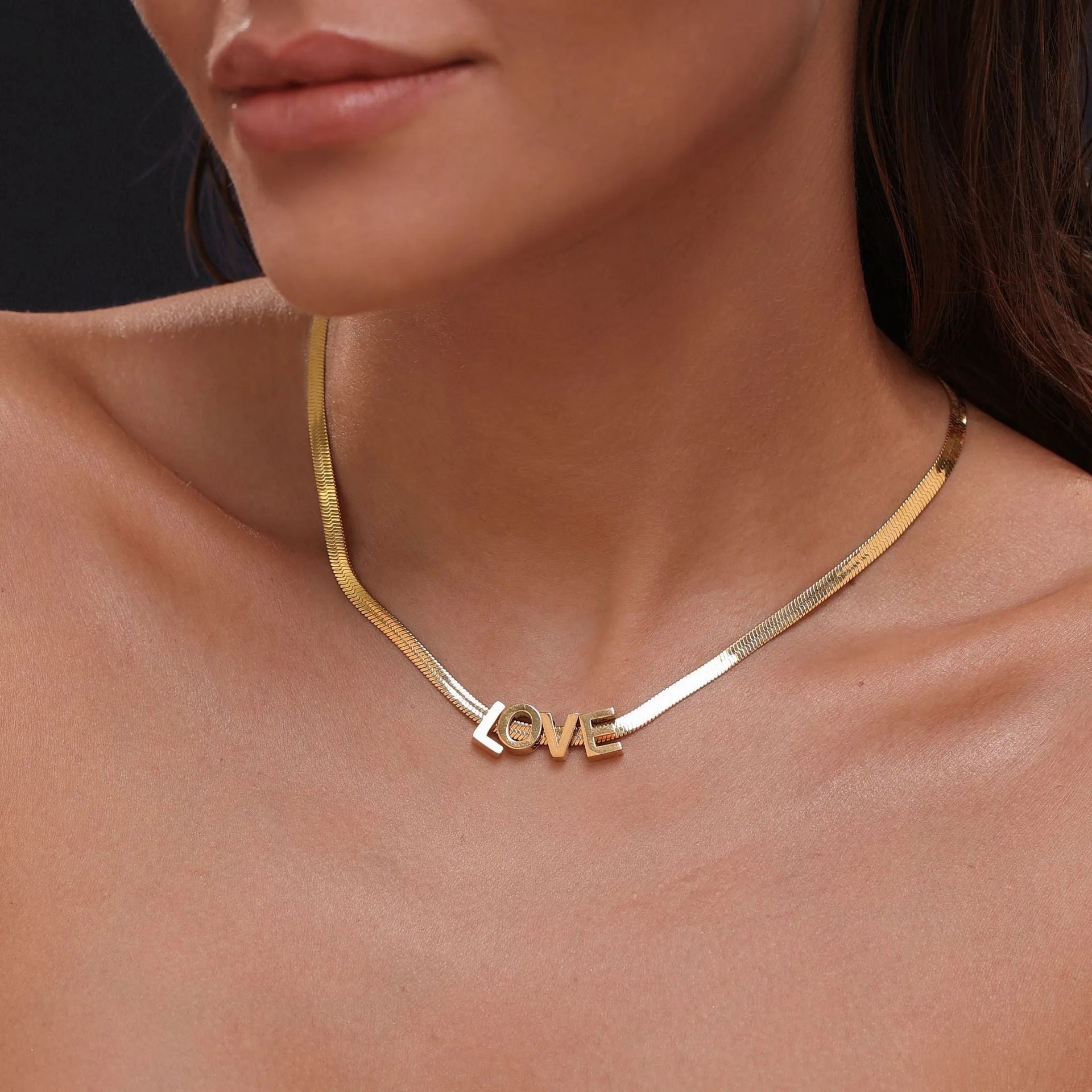 Titanium steel letter necklace with 40.5cm chain in gold electroplated finish showing number pendant