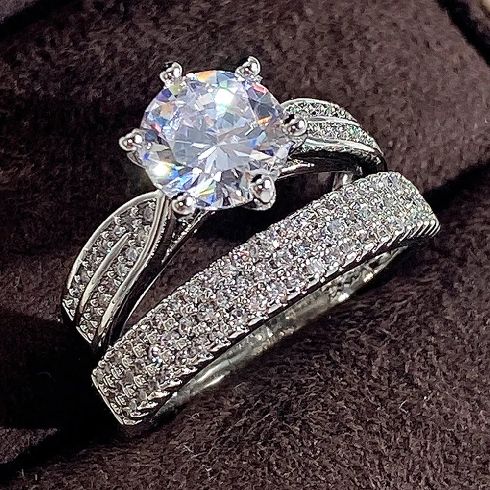 Alloy wedding ring with white gold colour finish showing geometry design and round elements