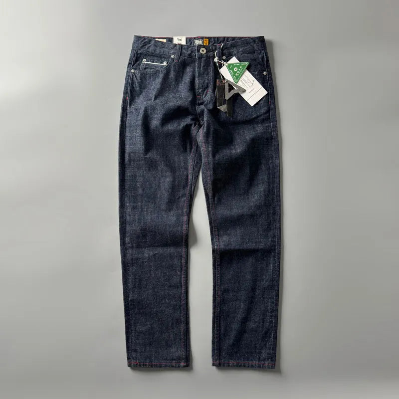 Men's straight leg denim trousers in primary colour with classic five-pocket styling