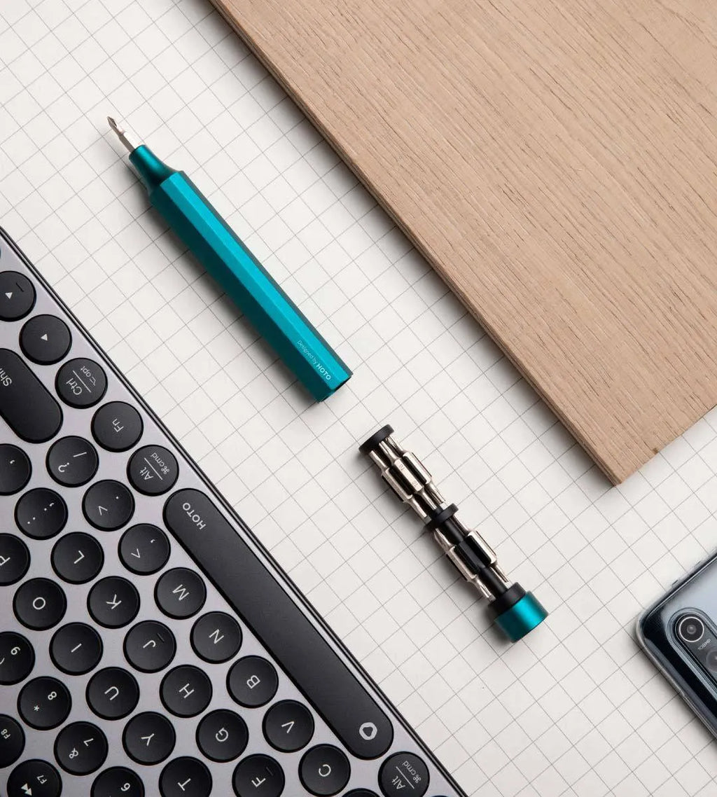 24-in-1 precision screwdriver set with aluminium handle and magnetic bit storage for phone and computer repairs