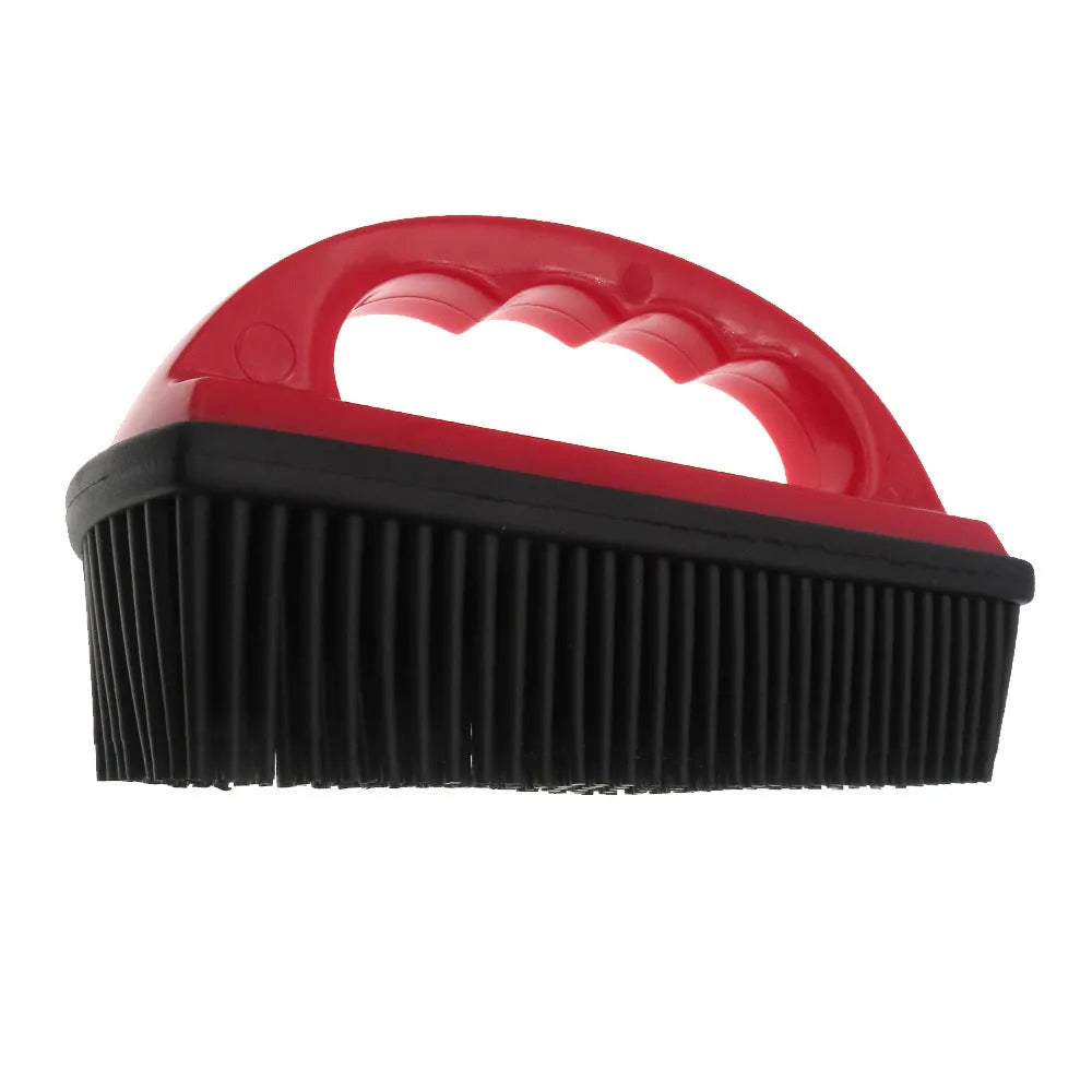 Red handheld pet hair removal brush with rubber bristles for grooming dogs and cleaning carpets.