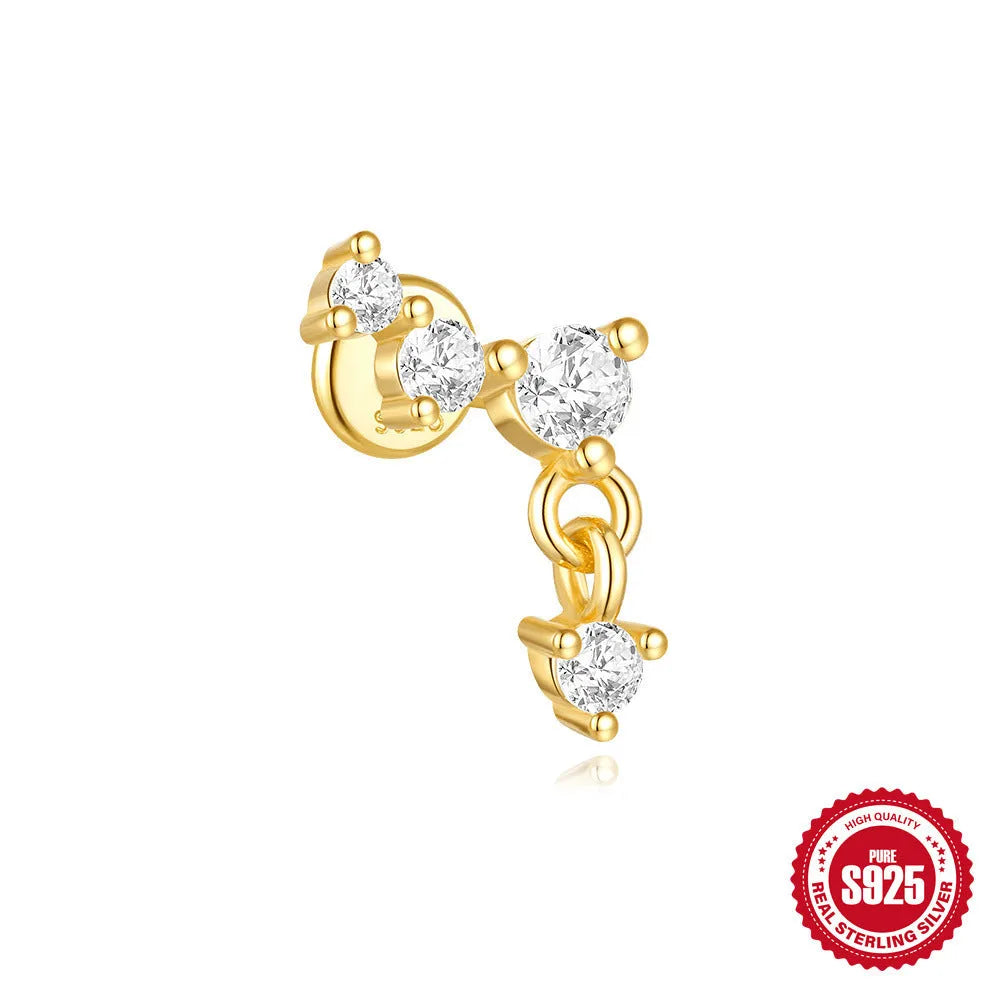 S925 sterling silver geometric moon and embedded star piercing earrings on a gold-colour background.