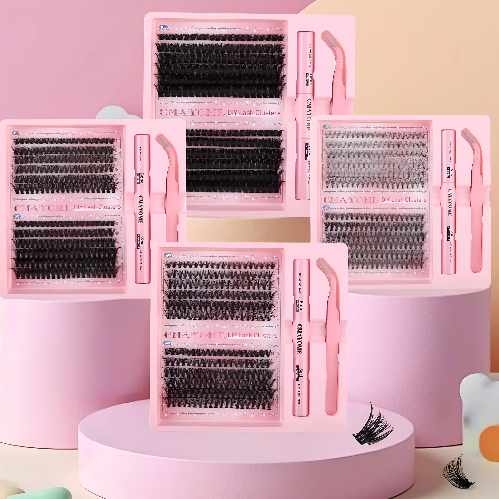 DIY single cluster false eyelashes set with adhesive and applicator tool on a white background.