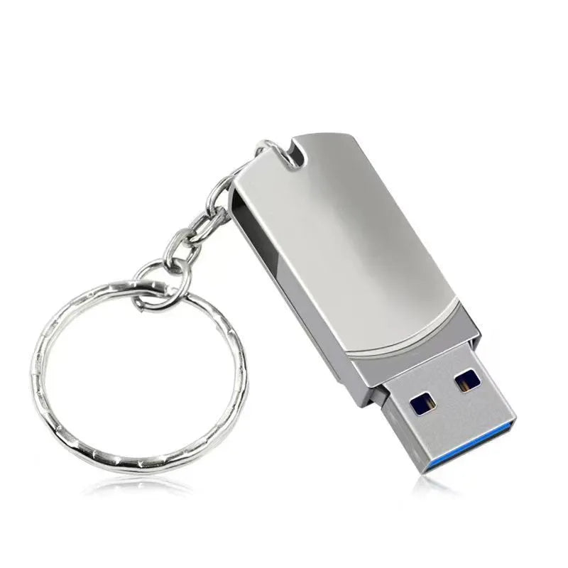White rotating metal USB 3.0 flash drive in compact small fat design on a grey background.