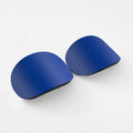 A pair of black PU mini shin guards for football and sports, shown with sizing codes S and XS.