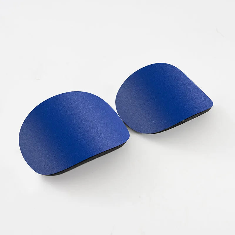 A pair of black PU mini shin guards for football and sports, shown with sizing codes S and XS.