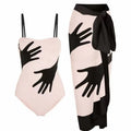 Women's one-piece bikini swimsuit with an attached white tulle skirt.