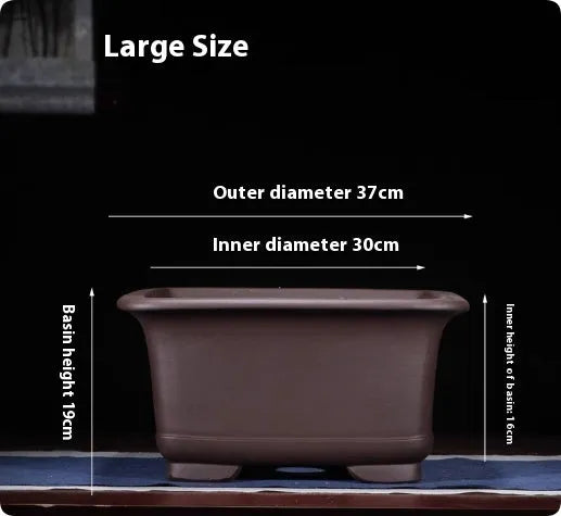 Large purple clay Chinese style flower pot for indoor bonsai or plants.