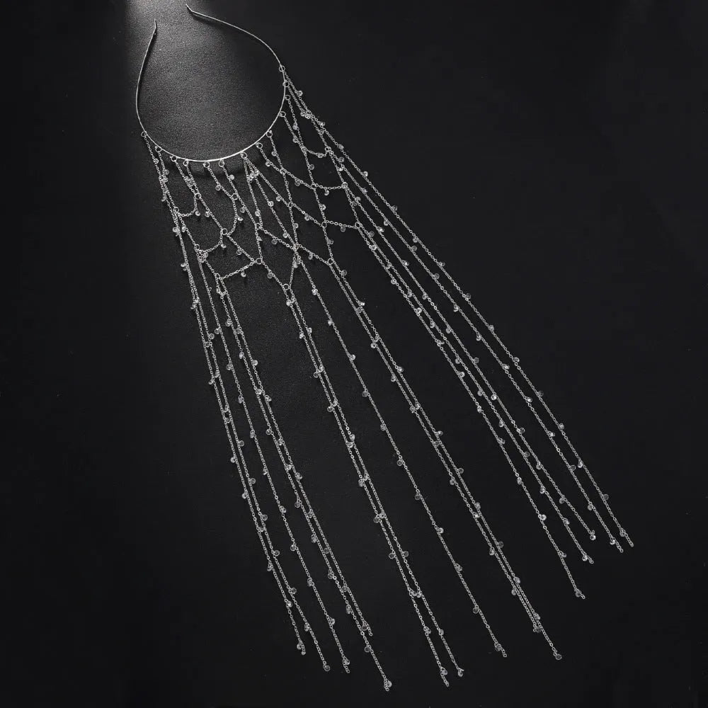Gold mesh rhinestone headband with tassel detail showing electroplated finish and decorative elements