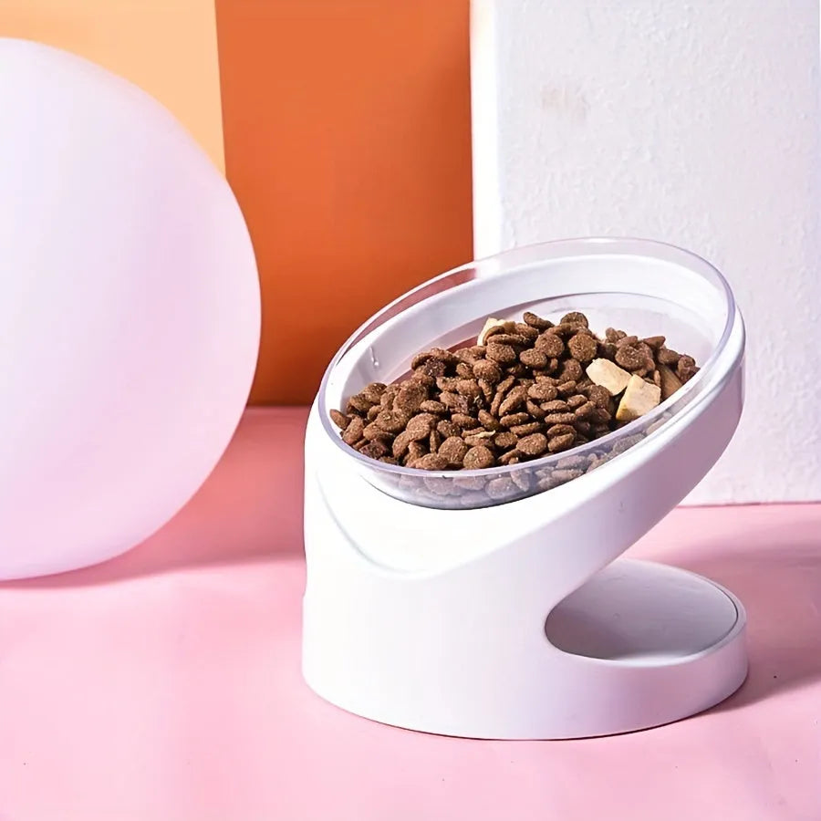 White elevated tilt cat food bowl made from clear durable plastic.